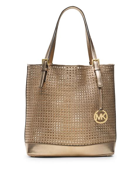 michael kors ruby purse gold|michael kors large gold tote.